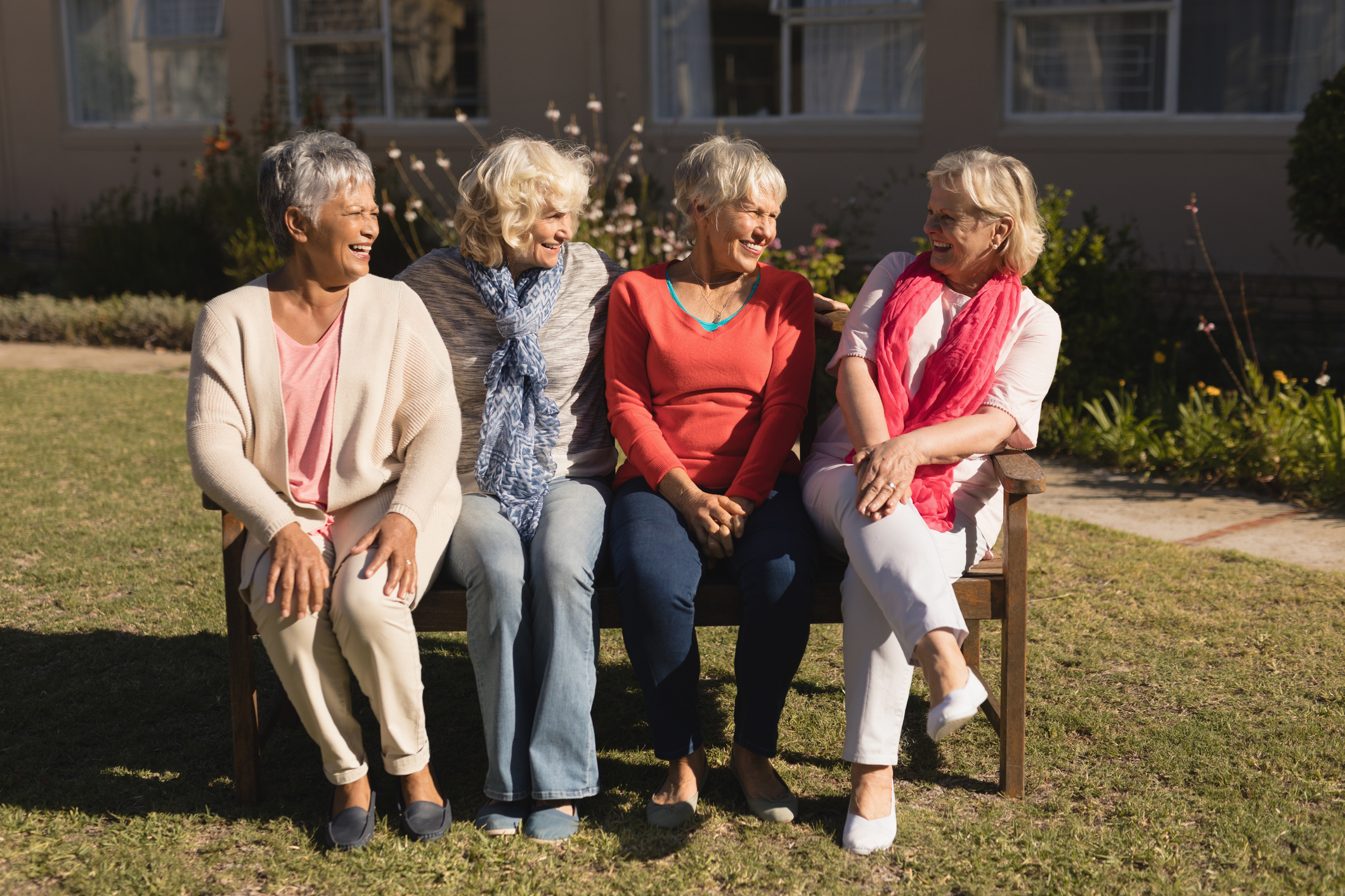 Group of senior women interacting with each other in the park